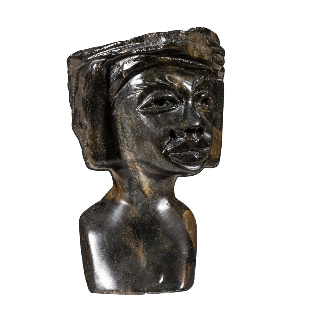 Beeld hoofd steen wijze man. Stenen kunst uit Afrika