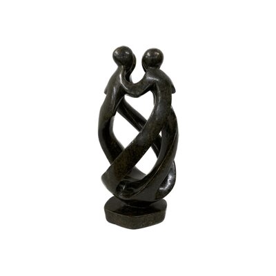 Coopération en sculpture de pierre 4 personnes d.vert 25 cm Coopération en sculpture de pierre 4 personnes d.vert 25 cm